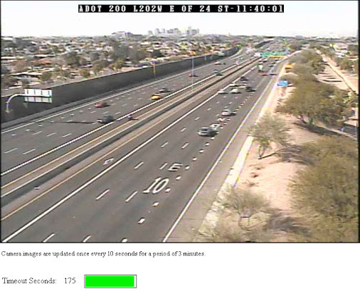 View of light freeway traffic captured with traffic camera