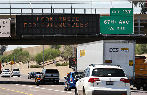 Highway sign: Look Twice for Motorcycles