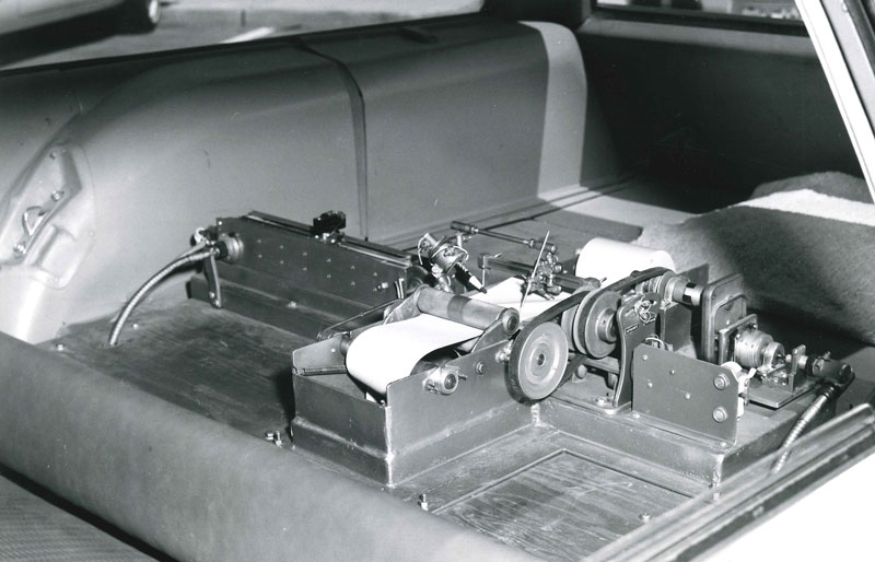 A bumpmeter installed in the trunk of a car used to measure the smoothness of roads.