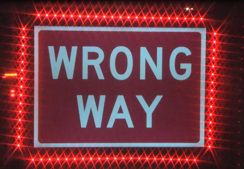 Wrong way road sign