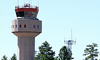 Airport Tower standing above the pines