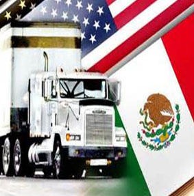 Commercial truck with us and mexico flags