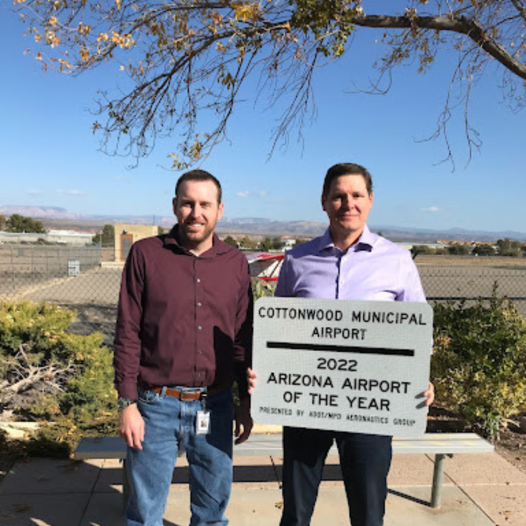 ADOT's Matthew Munden on left and Cottonwood Airport's Jeffrey Tripp on right