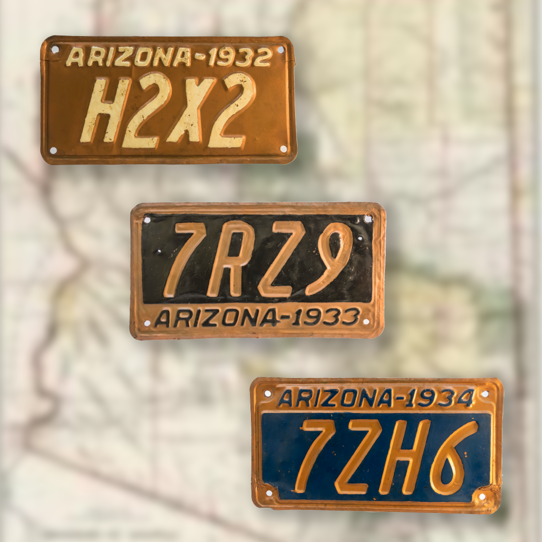 Three copper license plates from the 1930s are pictured over a background of a map of the state of Arizona.