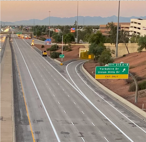 A highway with no cars traveling on it because it's closed for roadwork.