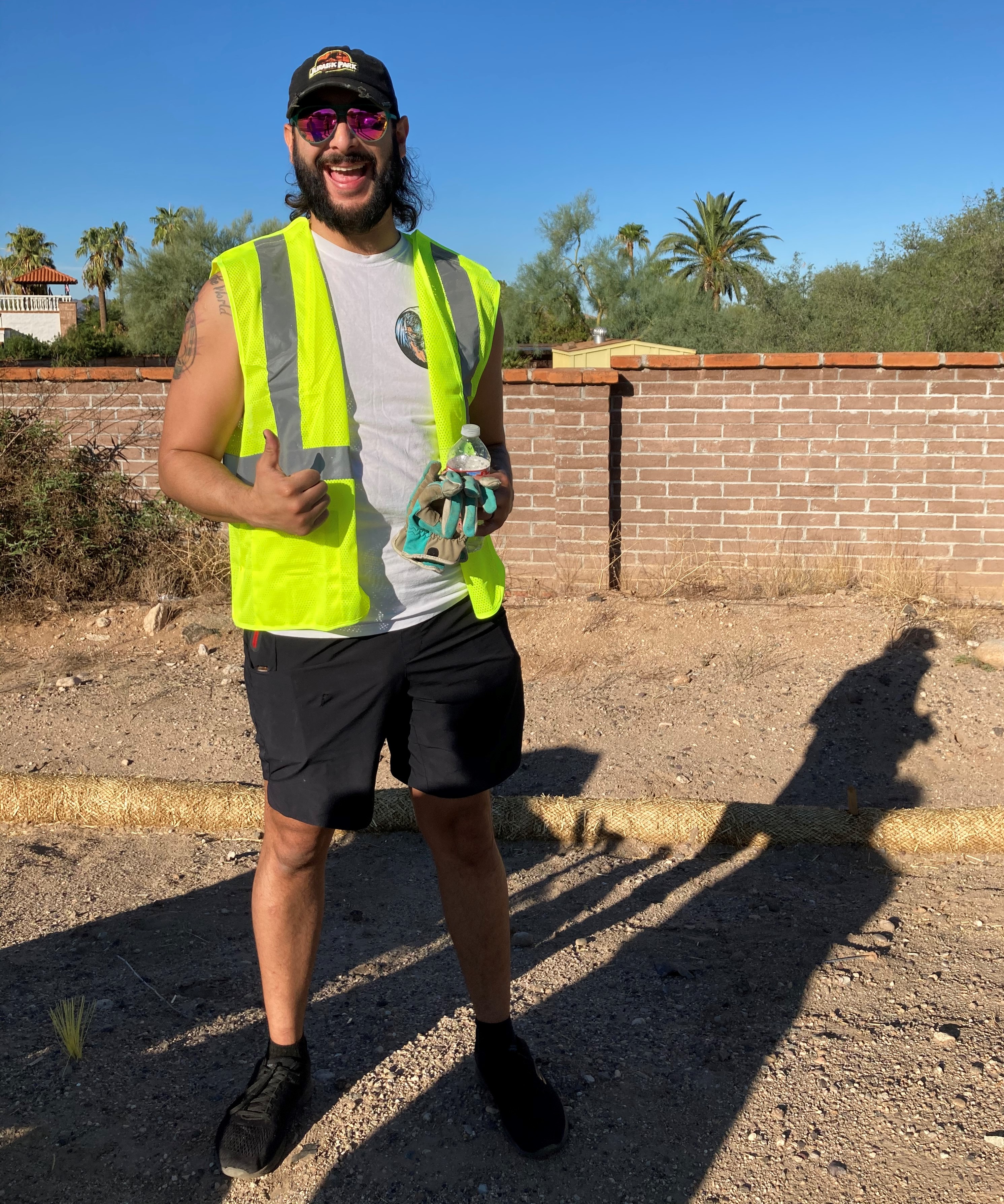 A man picks up litter.