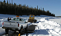ADOT plowing snow