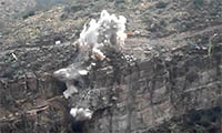 Blasting a mountain