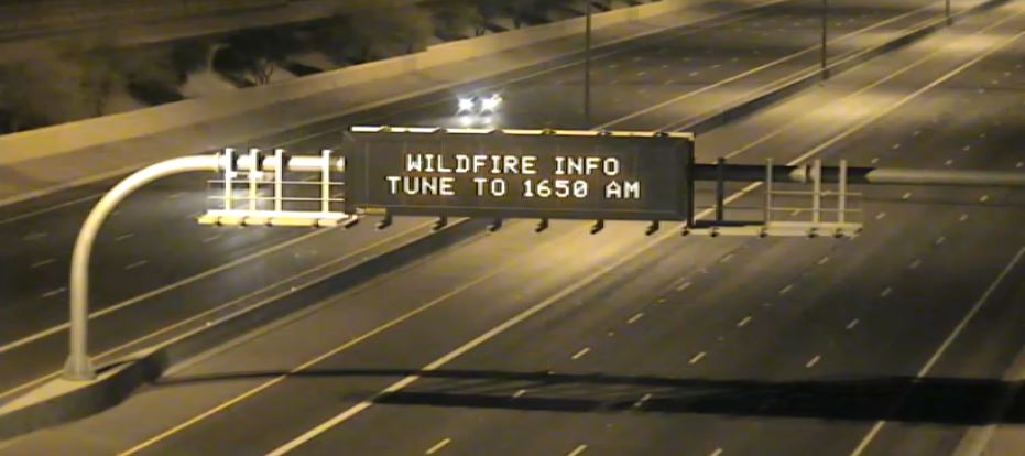 Wildfire Info Tune to 1650 AM - Highway sign