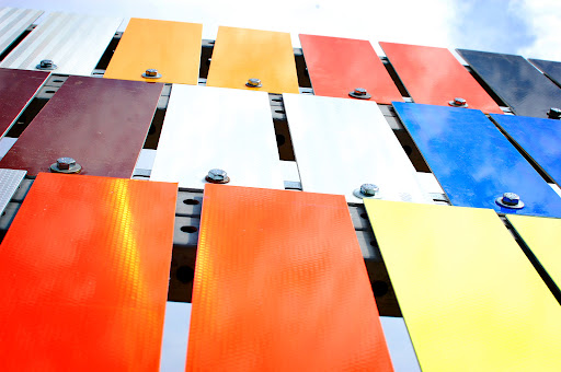 Sign samples of different colors arrayed for sun test