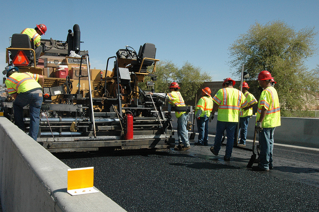 Crew paves with rubberized asphalt