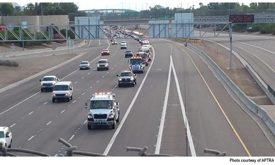 Tow truck parade on freeway