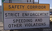Sign reading Safety Corridor Strict Enforcement.
