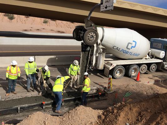 Crew pours concrete during South Mountain Freeway construction