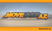 Text Move Over AZ in bold yellow and gray letters with a blurry road background and an orange border.