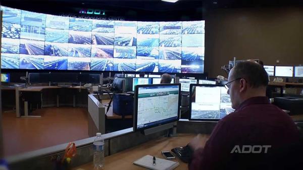 Worker at a desk in the Traffic Operations Center