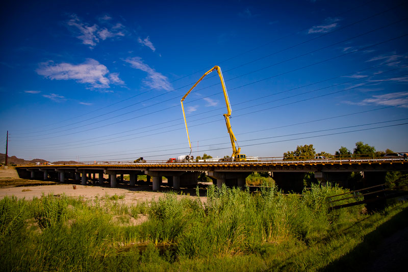 Concrete poured for bridge deck over Santa Cruz River near I-10