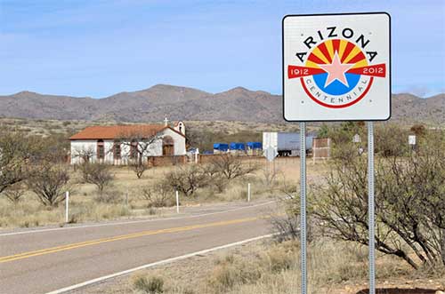 Arizona Centennial sign along State Route 286