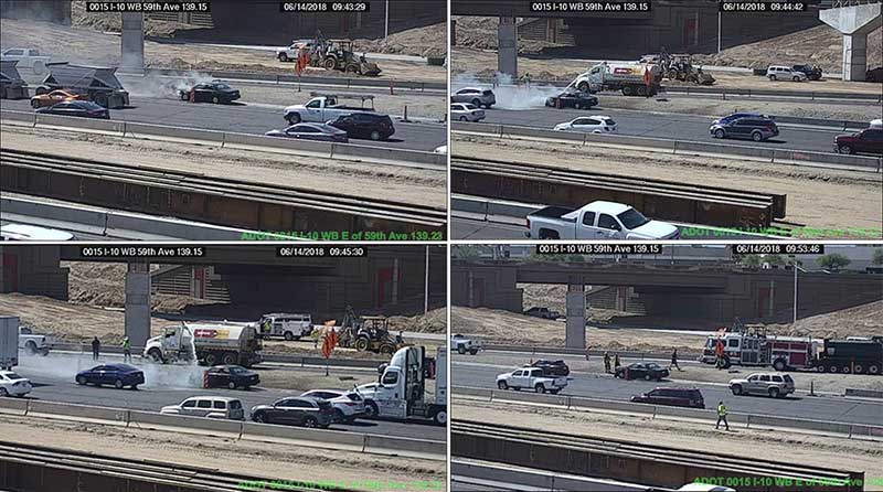 Traffic camera views of freeway vehicle fire and response
