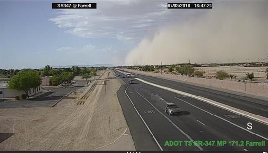 Approaching dust storm viewed from freeway camera