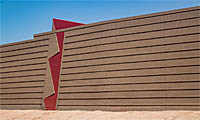 Section of freeway sound wall inspired by Frank Lloyd Wright