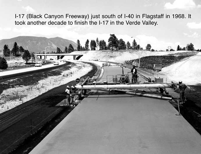 Black and white photo of the I-17 freeway under construction near I-40 in Flagstaff, Arizona, in 1968, with workers and equipment paving the roadway.