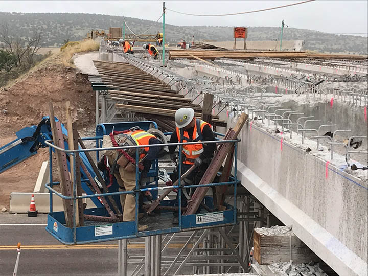 Road crew working on improving a bridge at I 40 near Seligman.