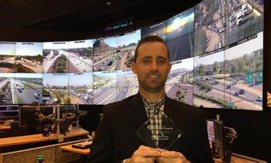 Wrong Way System award and man holding it