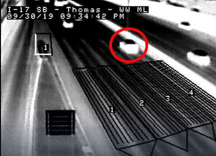 Thermal camera video frame grab showing wrong-way vehicle. 