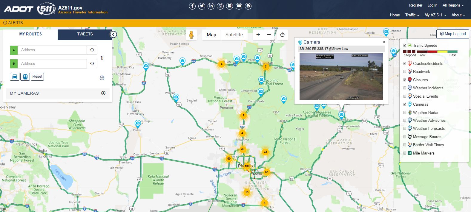 Screenshot of the Arizona 511 traffic map showing routes, live camera feeds, traffic incidents, and map legend with various traffic conditions and alert categories.