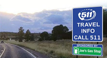 511 Travel Info sign along a highway.