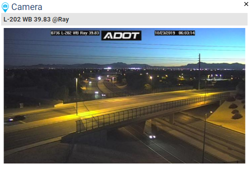 Twight view of freeway interchange through traffic camera