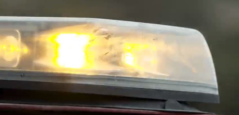Closeup of flashing amber lights on an ADOT vehicle