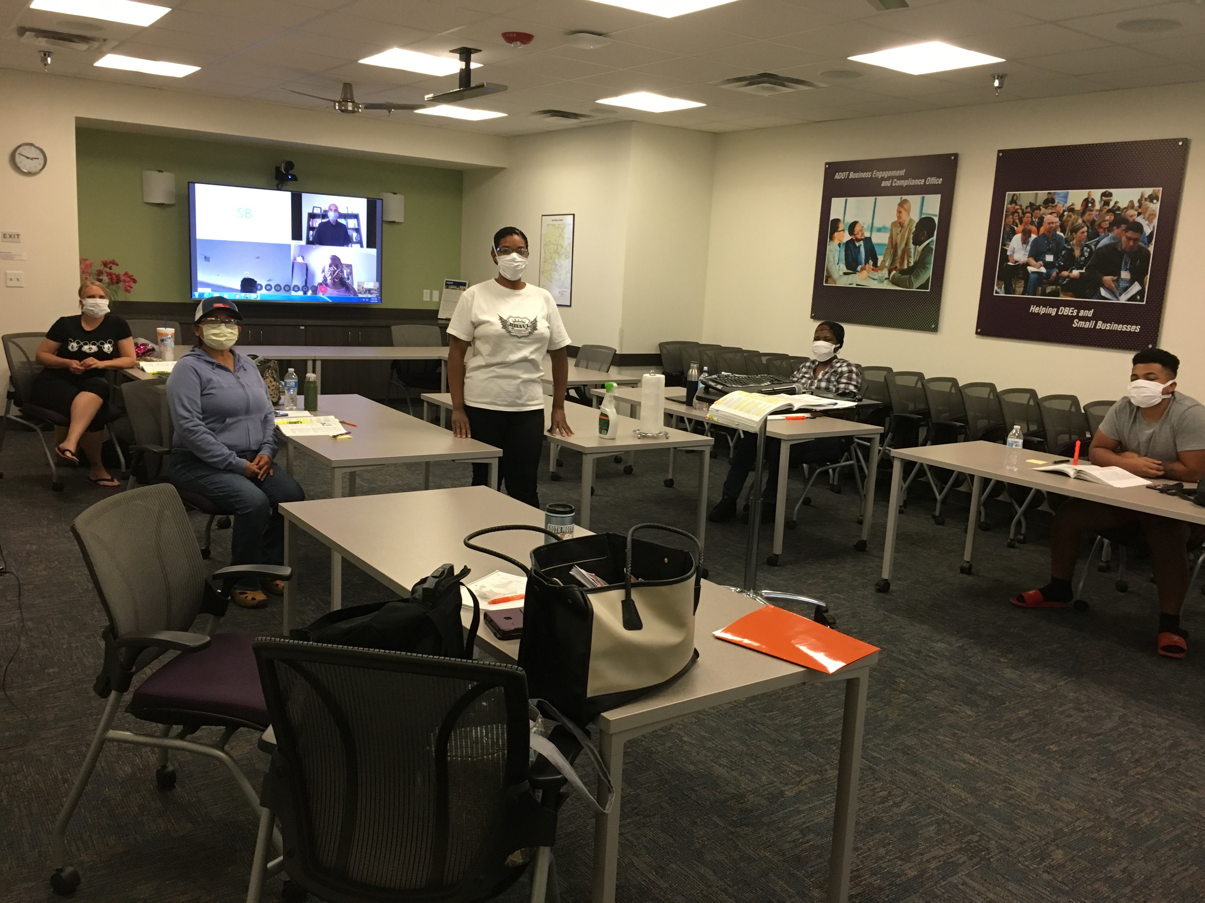 Masked participants in Construction Academy classroom