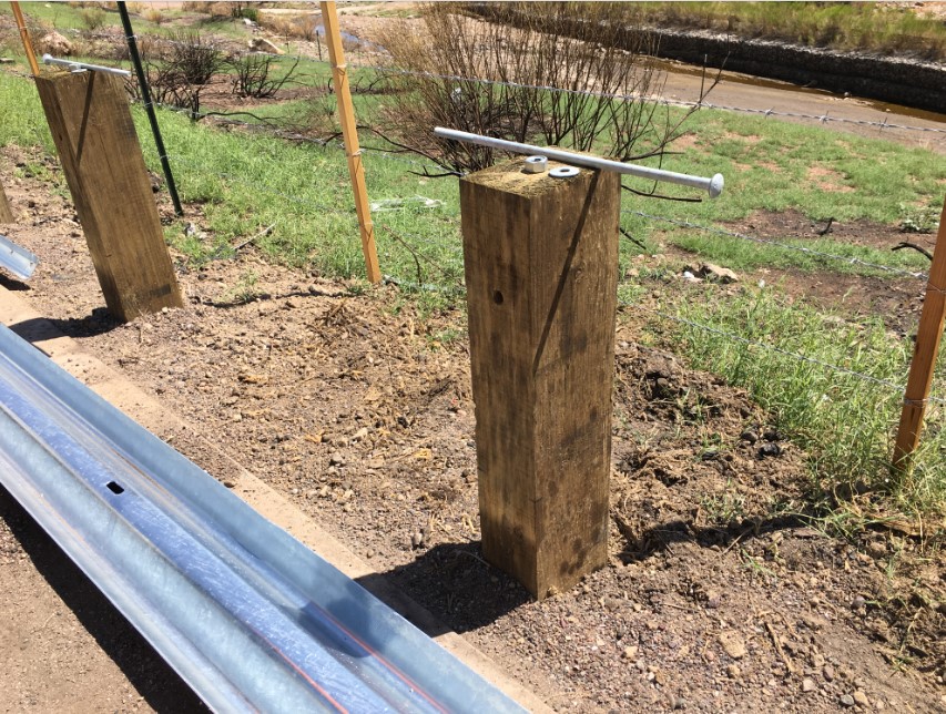 Guardrail posts, rail and bolts, awaiting assembly