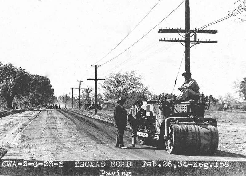 Black and white photo of road paving