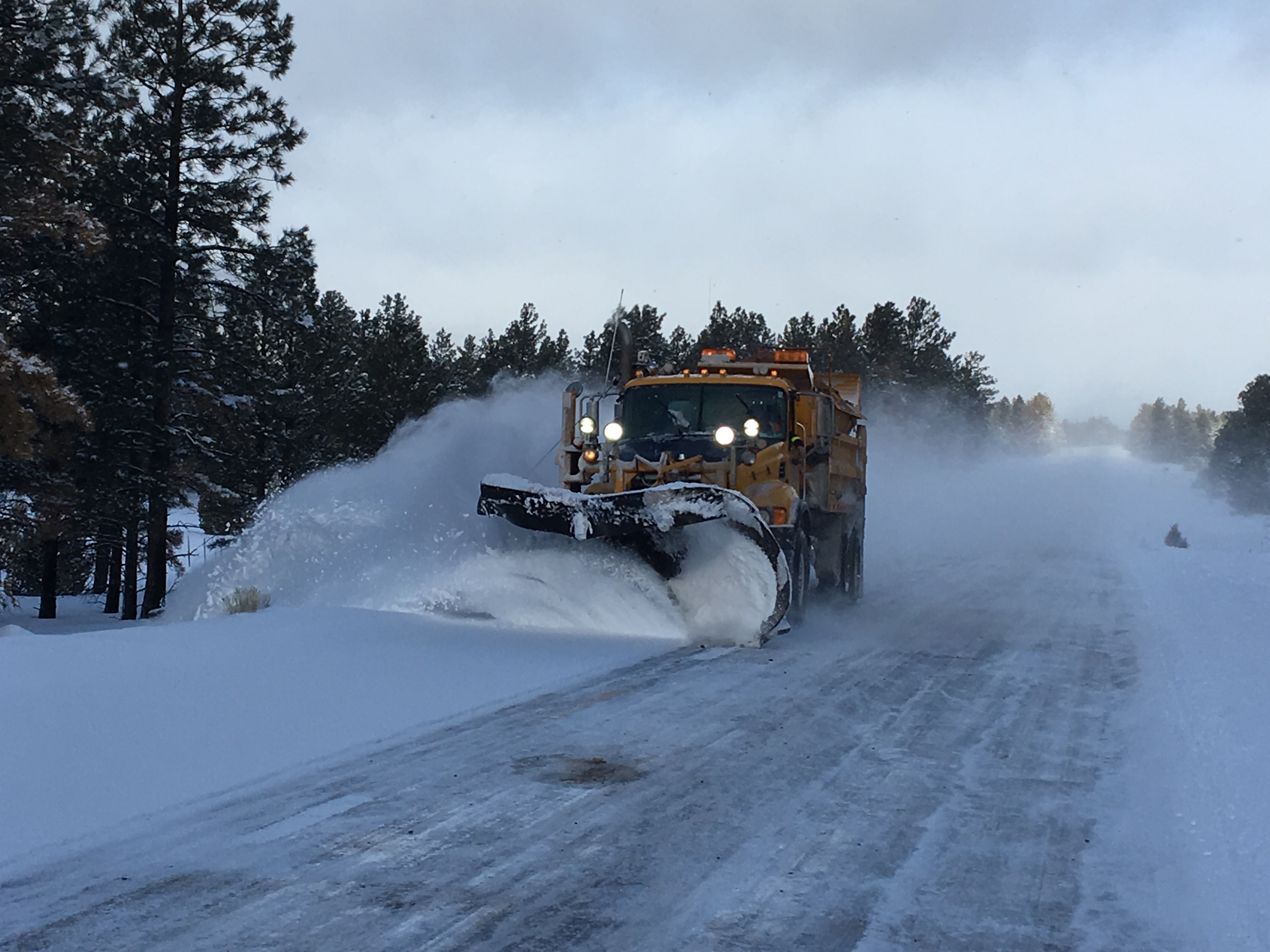 ADOT snowplow clears snow on highway in Arizona’s mountain areas