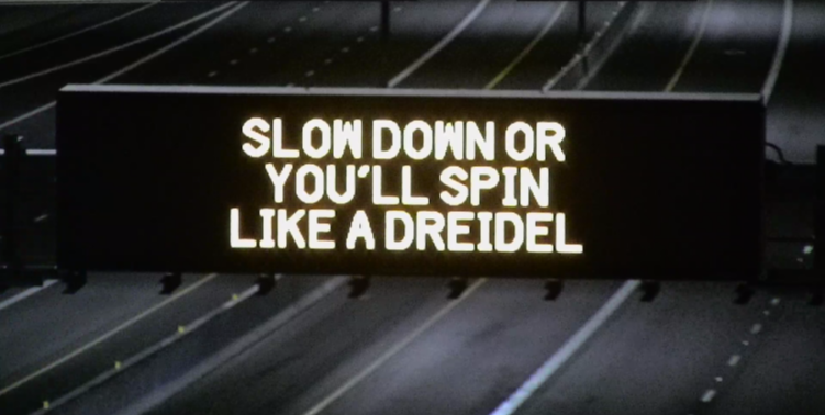 Freeway board with holiday safety message