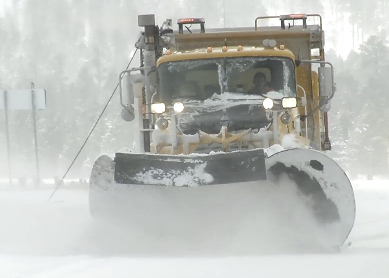 One of the ADOT Snowplows clears highways of snow and ice