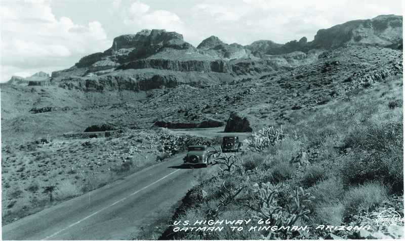 Black and white historic image of a vehicle on Route 66