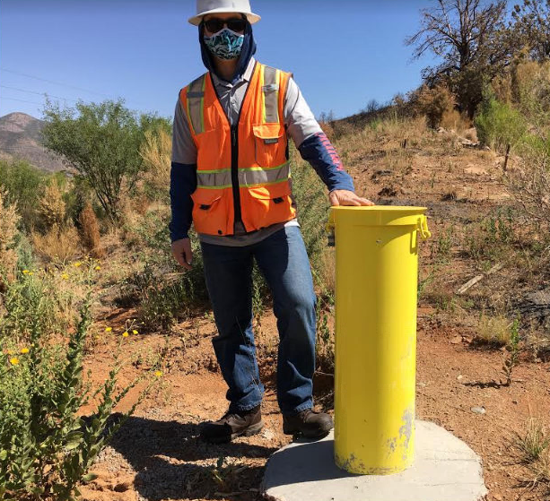 An ADOT engineer in training is shown at a project site.