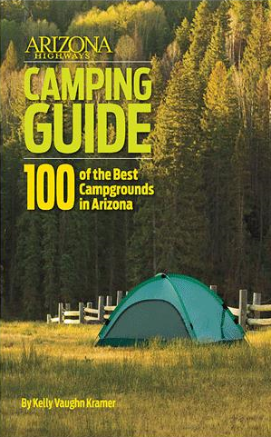 A green tent set up in a grassy area surrounded by trees; cover of Arizona Highways Camping Guide book.