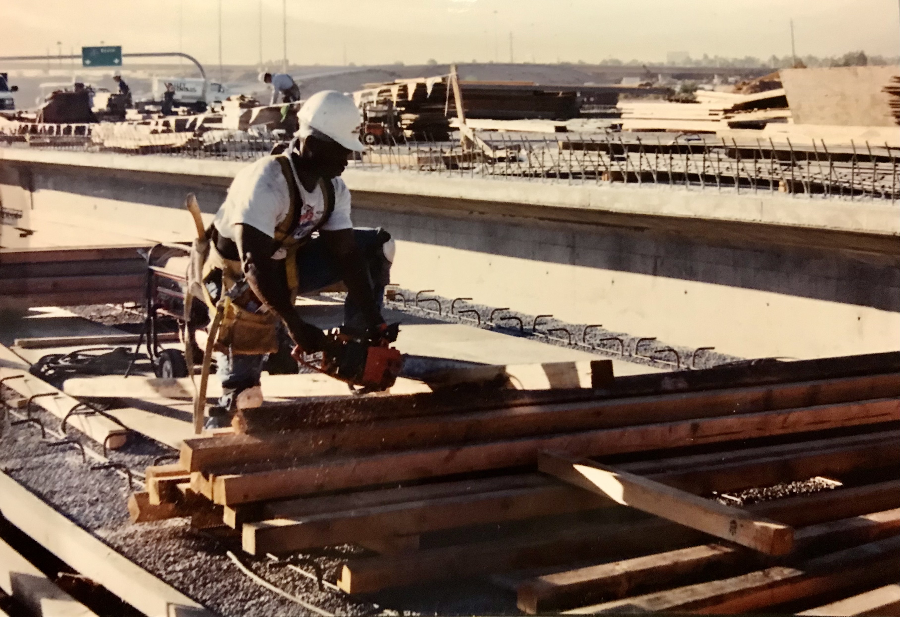 Construction worker next to materials