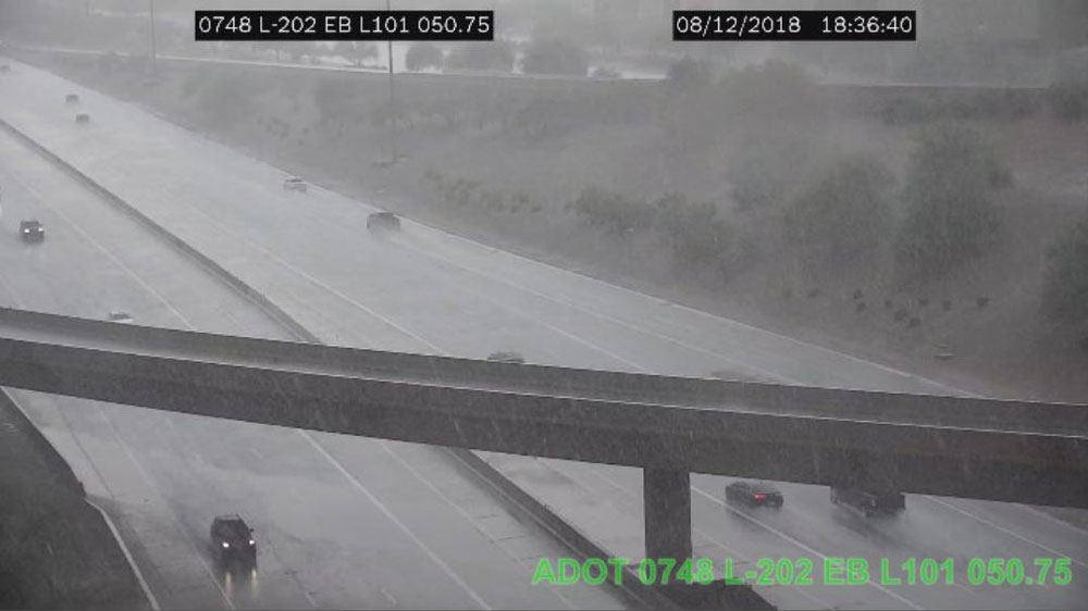 Traffic camera view of monsoon rain