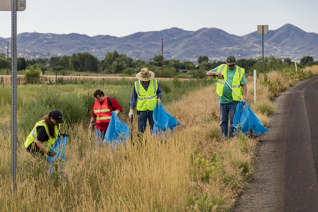 Volunteers pick up litter along highway