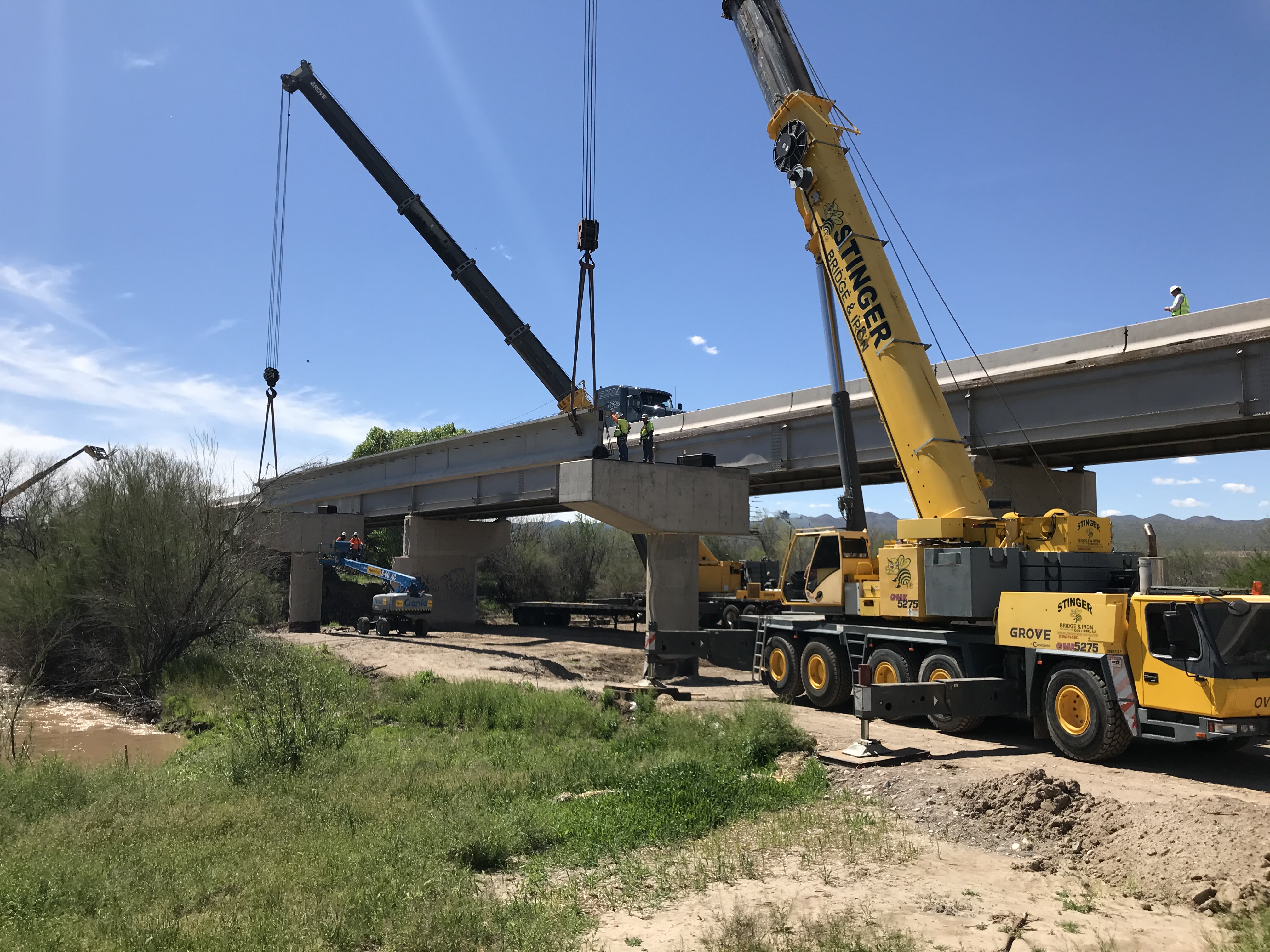Crane sets a bridge girder