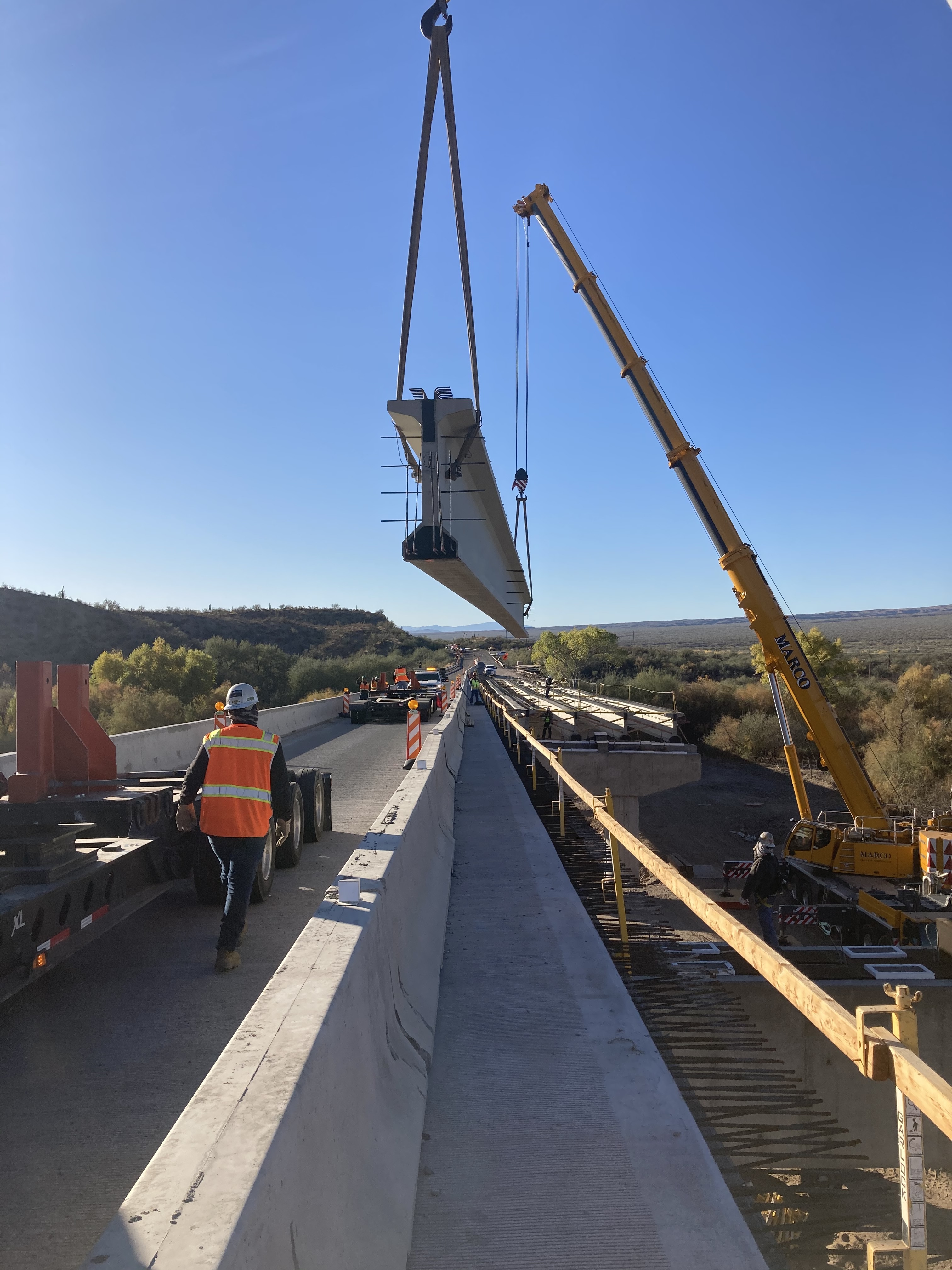Crane sets a bridge girder