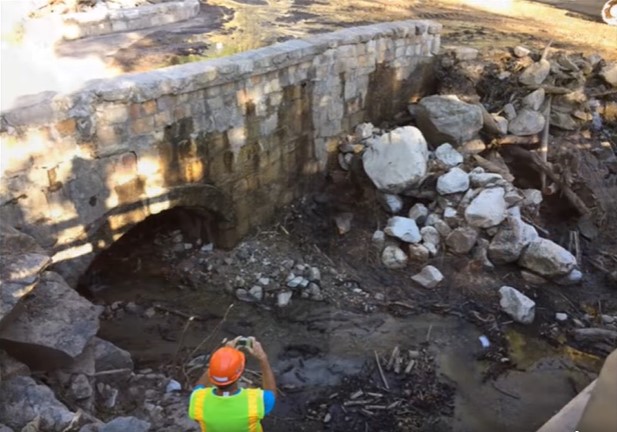 ADOT employee photographs damage to SR 366 bridge