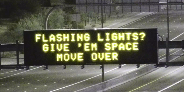 Freeway message board promoting Move Over law