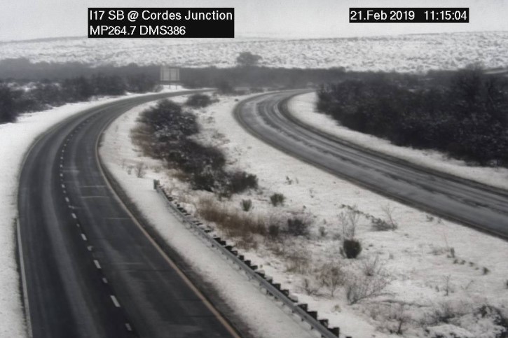 Traffic camera view of snow along I-17 at Cordes Junction